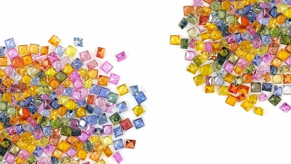 Colorful square-cut gemstones in pink, yellow, orange, blue, and green displayed in the Mittal Gems exclusive collection banner.